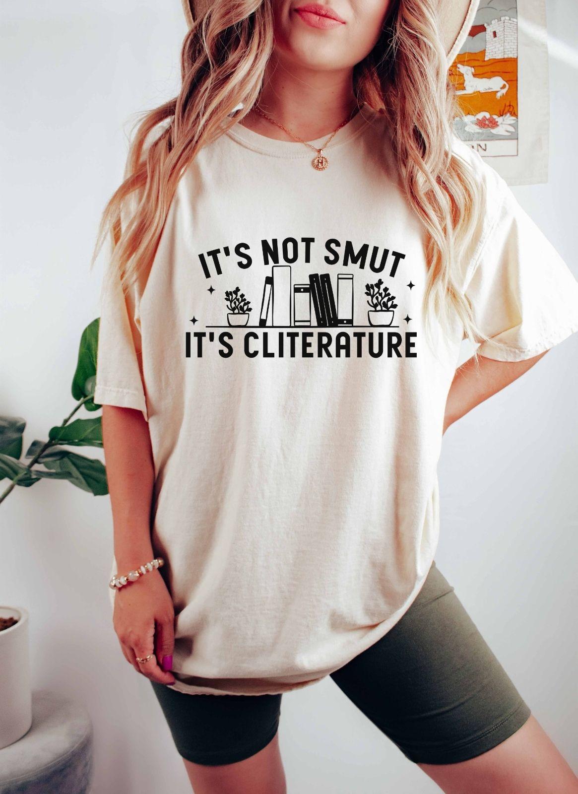 A comfort colors shirt with the saying "It's not smut it's cliterature"