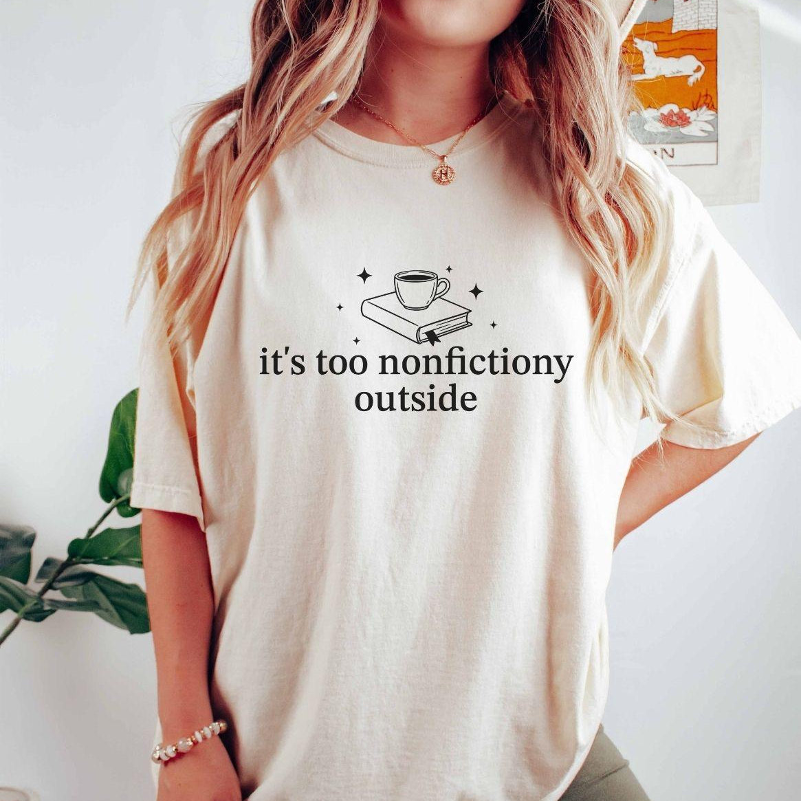 A comfort colors® shirt with the saying "it's too nonfictiony outside"
