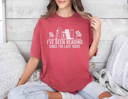 A comfort colors® shirt with the saying "i've been reading since the late 1900s"