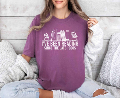 A comfort colors® shirt with the saying "i've been reading since the late 1900s"