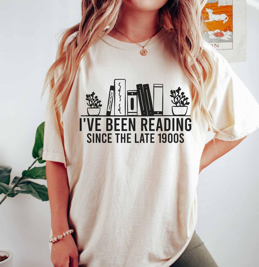 A comfort colors® shirt with the saying "i've been reading since the late 1900s"