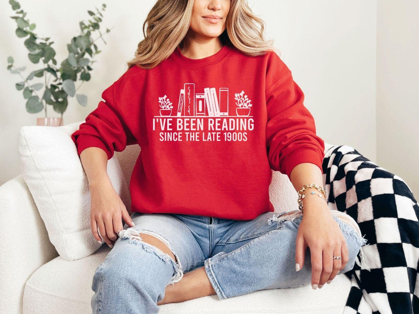 A Gildan 18000 sweatshirt with the saying "I've been reading since the late 1900s"