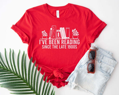 A bella canvas 3001 shirt with the saying "i've been reading since the late 1900s"