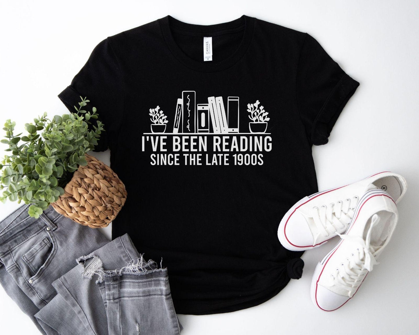 A bella canvas 3001 shirt with the saying "i've been reading since the late 1900s"
