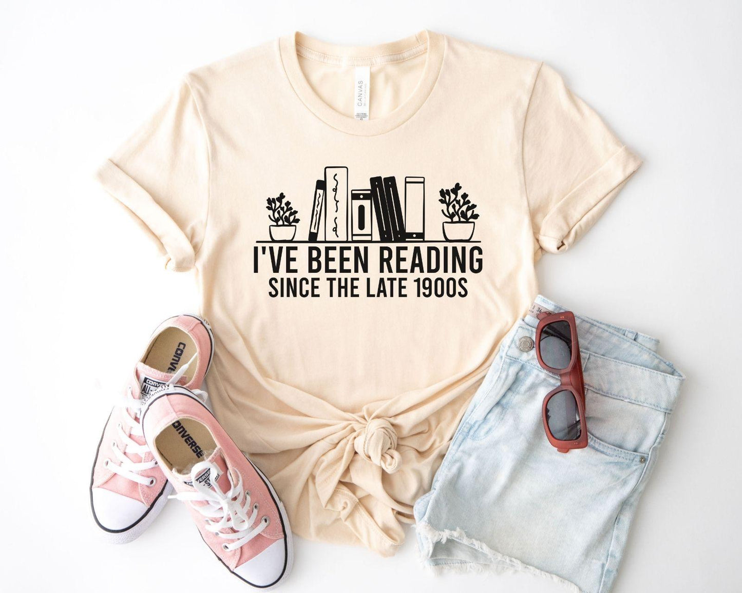 A bella canvas 3001 shirt with the saying "i've been reading since the late 1900s"