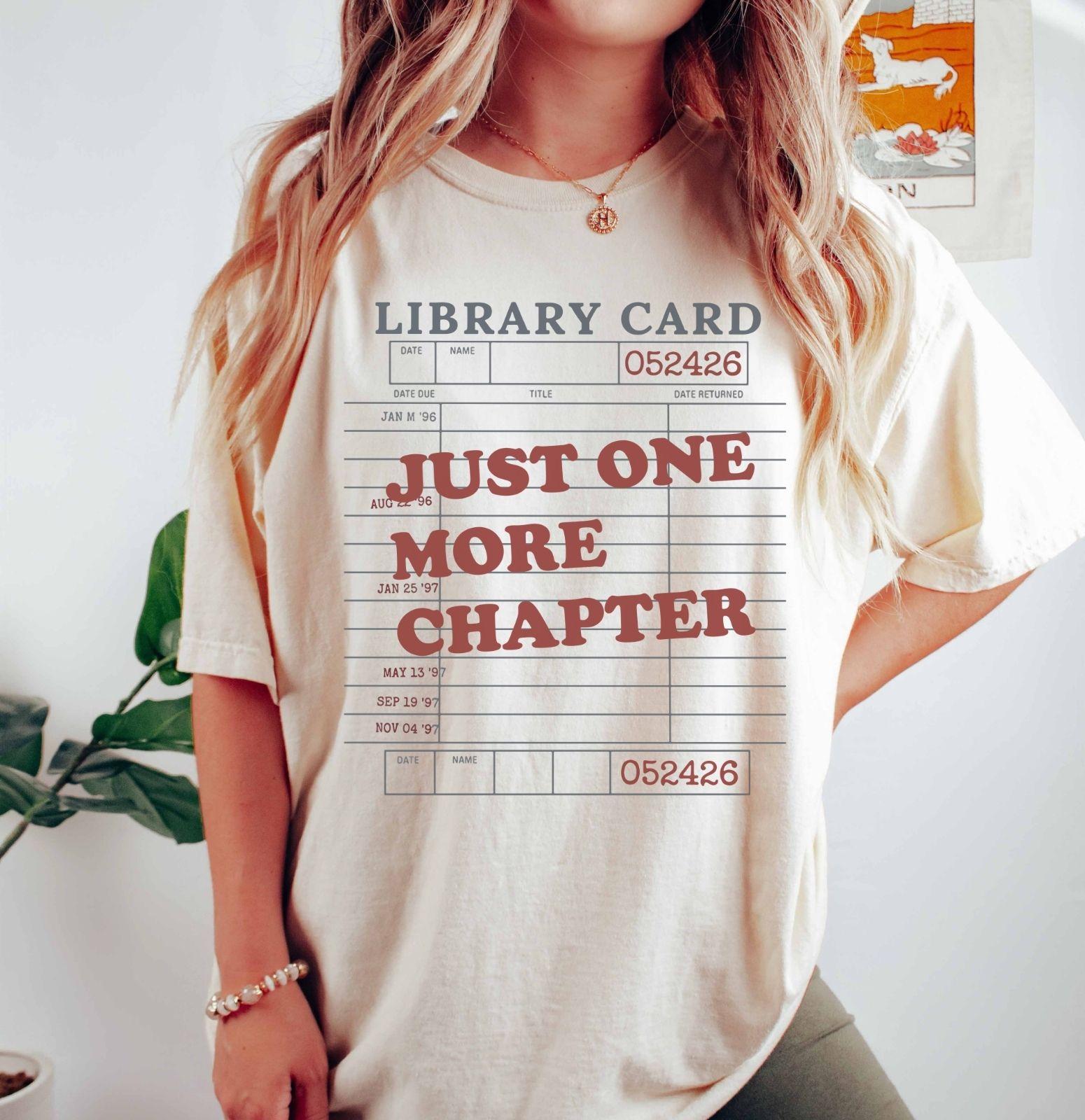 A comfort colors® shirt with the saying "just one more chapter"