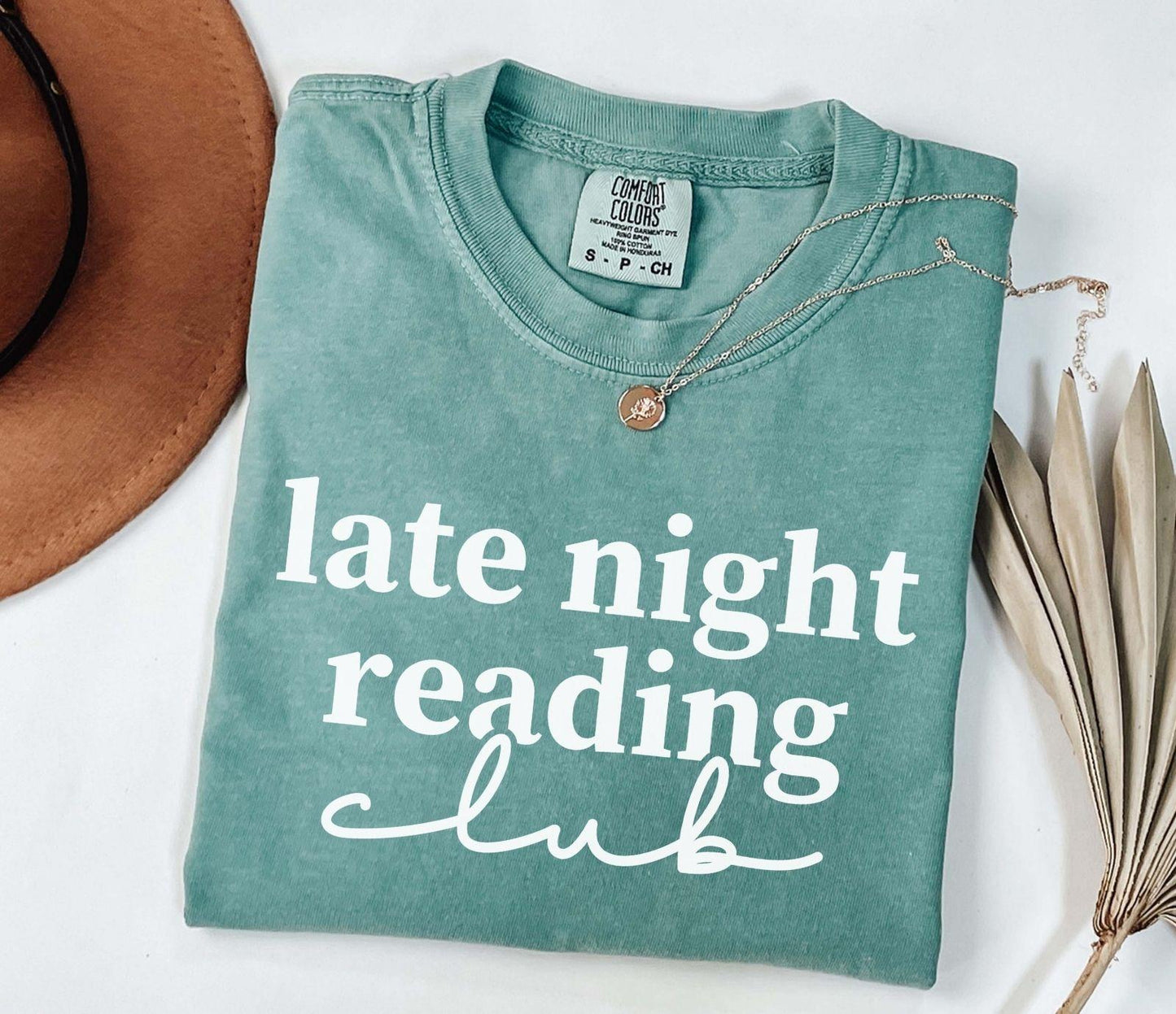 A comfort colors shirt with the saying "Late night reading"