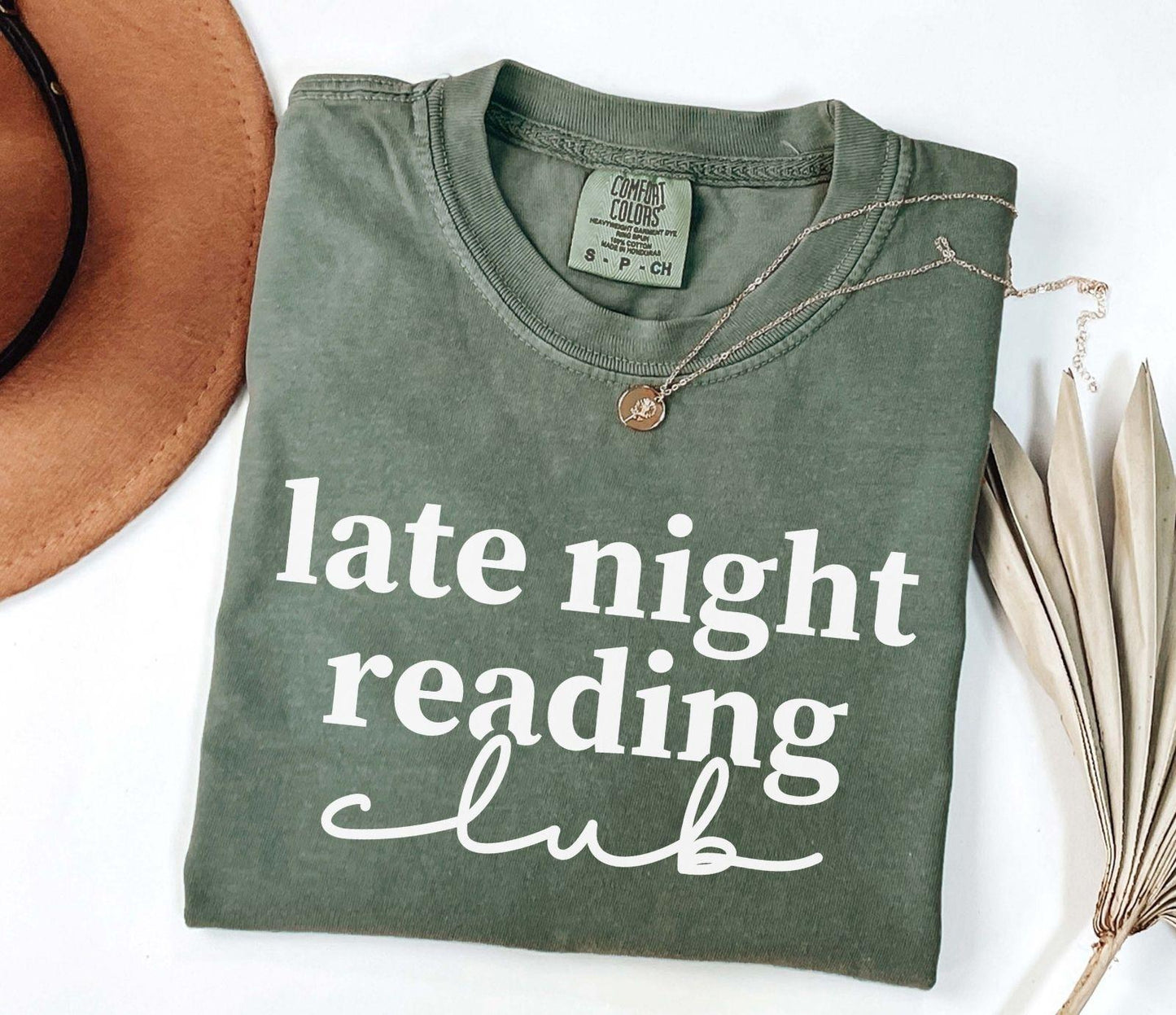 A comfort colors shirt with the saying "Late night reading"