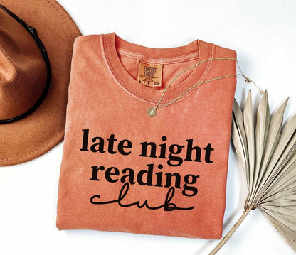 A comfort colors shirt with the saying "Late night reading"