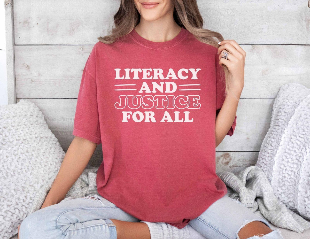 A comfort colors® shirt with the saying "Literacy and justice for all"