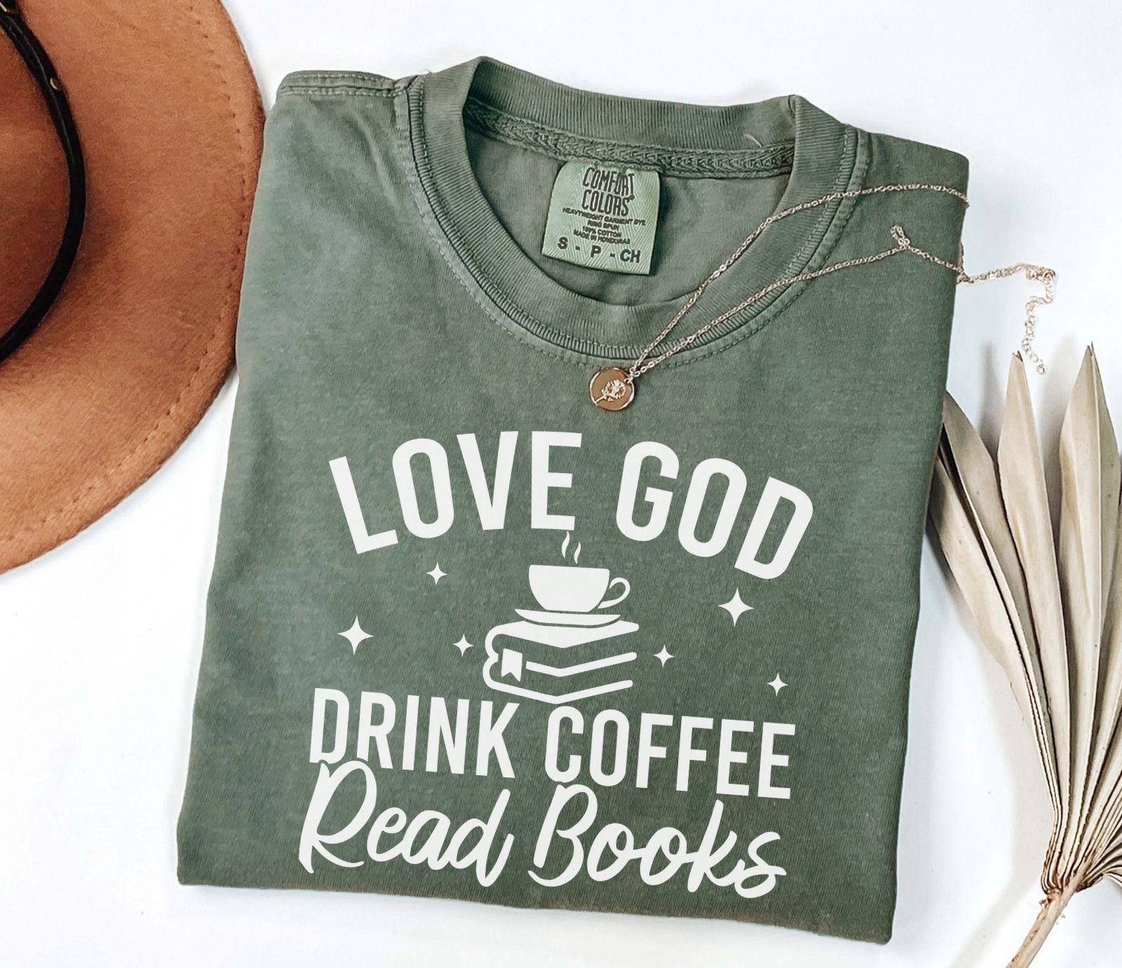 A comfort colors® 1717 shirt with the saying "Love god drink coffee read books"