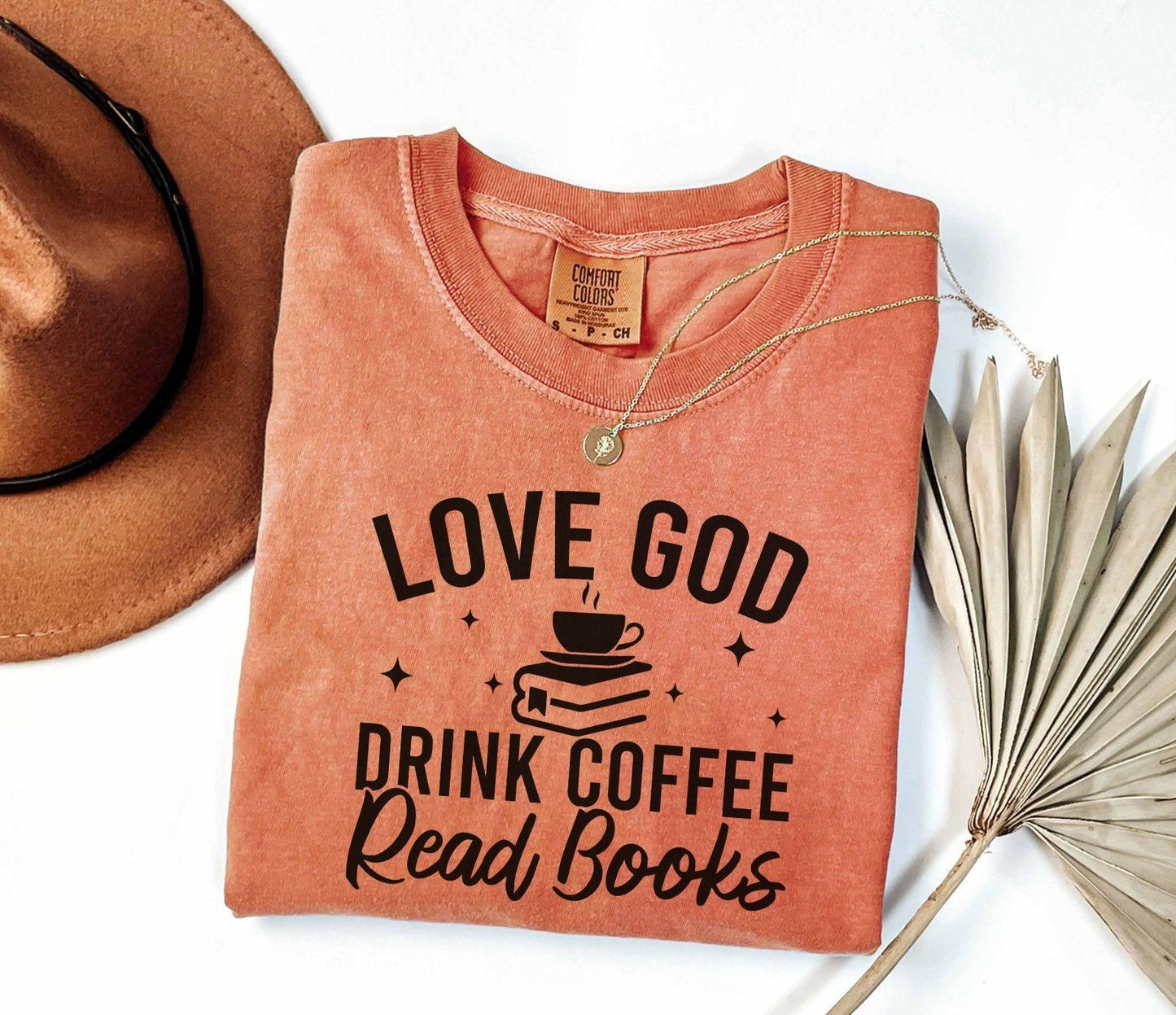 A comfort colors® 1717 shirt with the saying "Love god drink coffee read books"