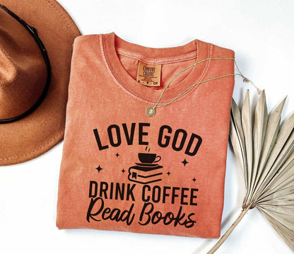 A comfort colors® 1717 shirt with the saying "Love god drink coffee read books"