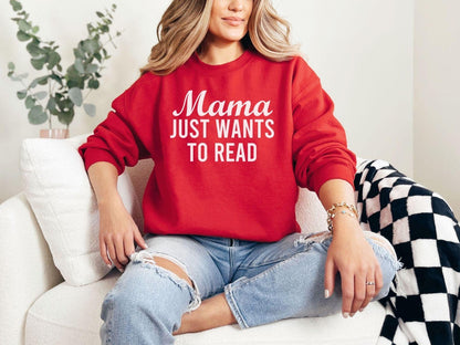 A Gildan 18000 sweatshirt with the saying "mama just wants to read"