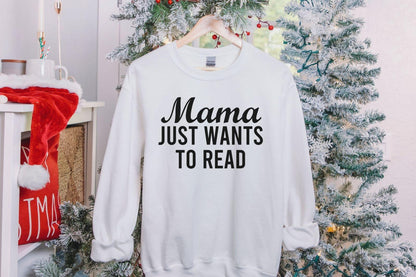 A Gildan 18000 sweatshirt with the saying "mama just wants to read"
