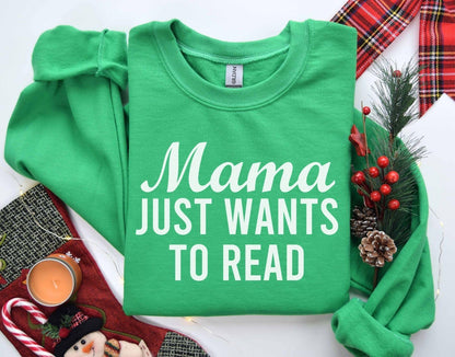 A Gildan 18000 sweatshirt with the saying "mama just wants to read"