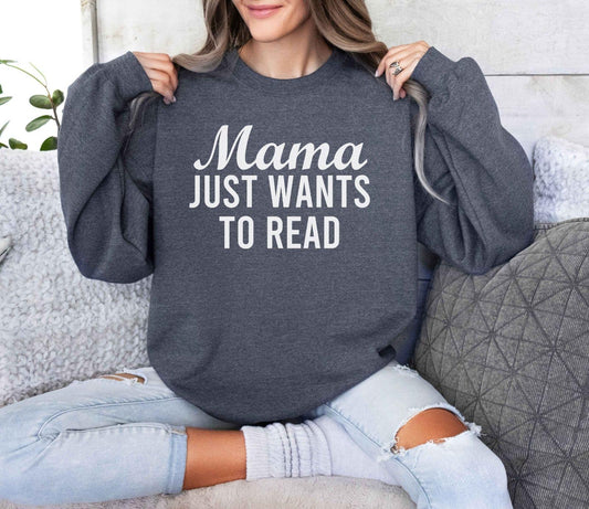 A Gildan 18000 sweatshirt with the saying "mama just wants to read"