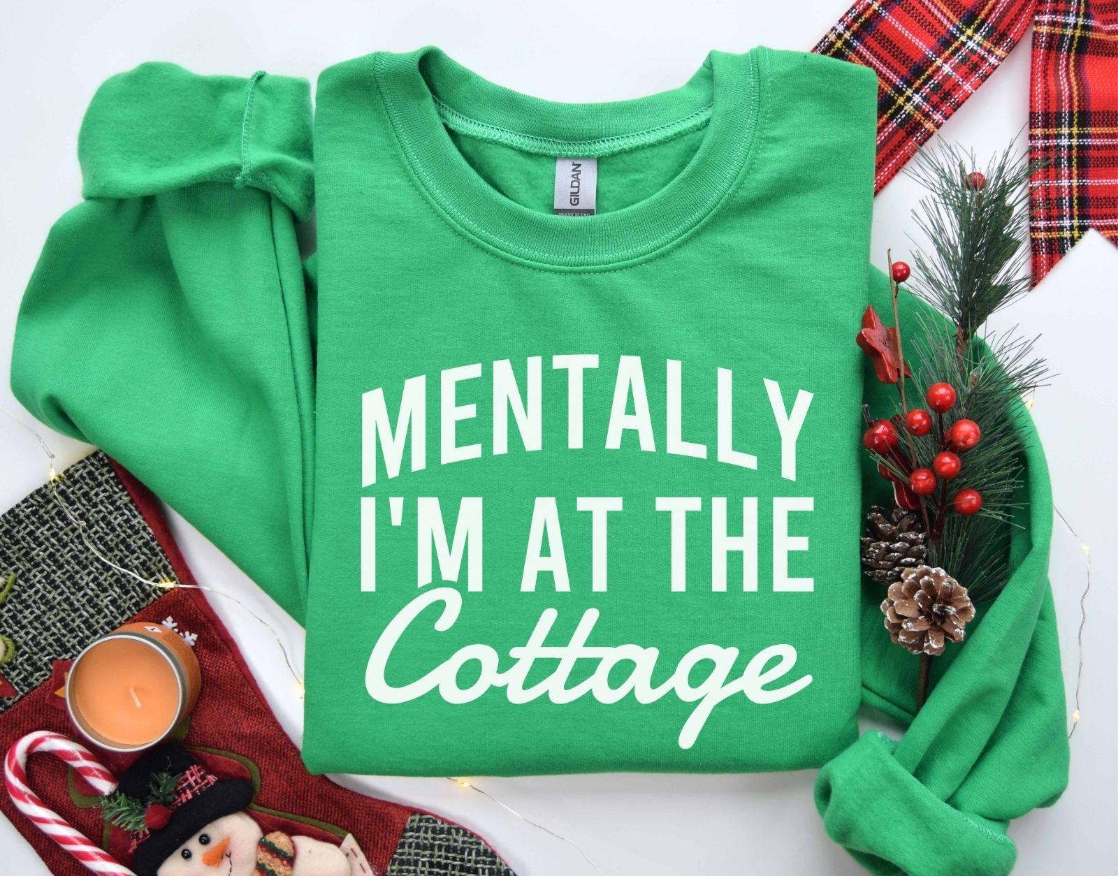 A Gildan 18000 sweatshirt with the saying "Mentally I'm at the cottage"