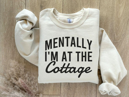 A Gildan 18000 sweatshirt with the saying "Mentally I'm at the cottage"