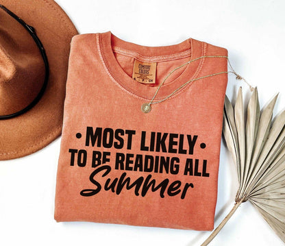 A comfort colors shirt with the saying "Most likely to be reading all summer"