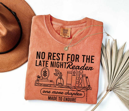 A comfort colors shirt with the saying "No rest for the late night readers one more chapter made to endure"