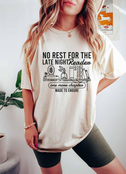 A comfort colors shirt with the saying "No rest for the late night readers one more chapter made to endure"