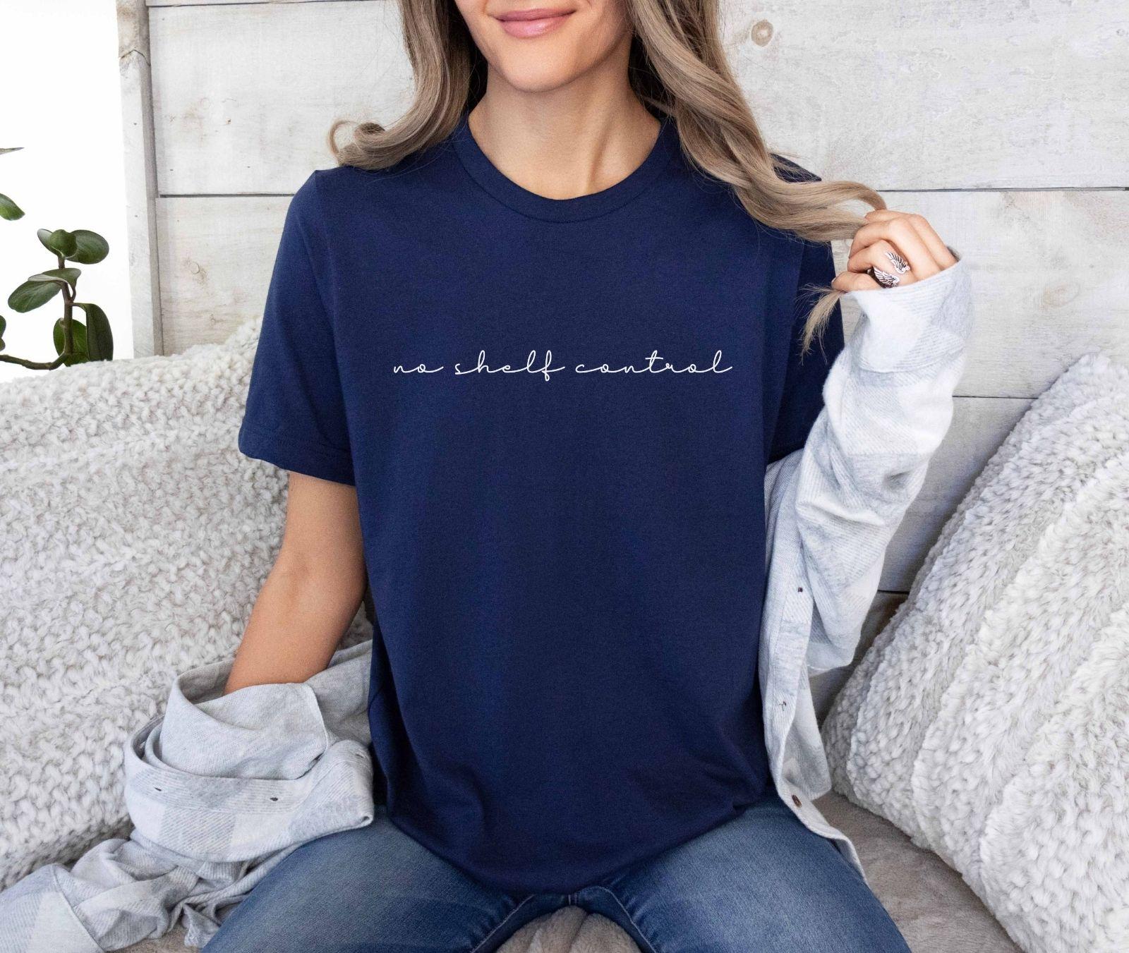 A comfort colors® shirt with the saying "no shelf control"