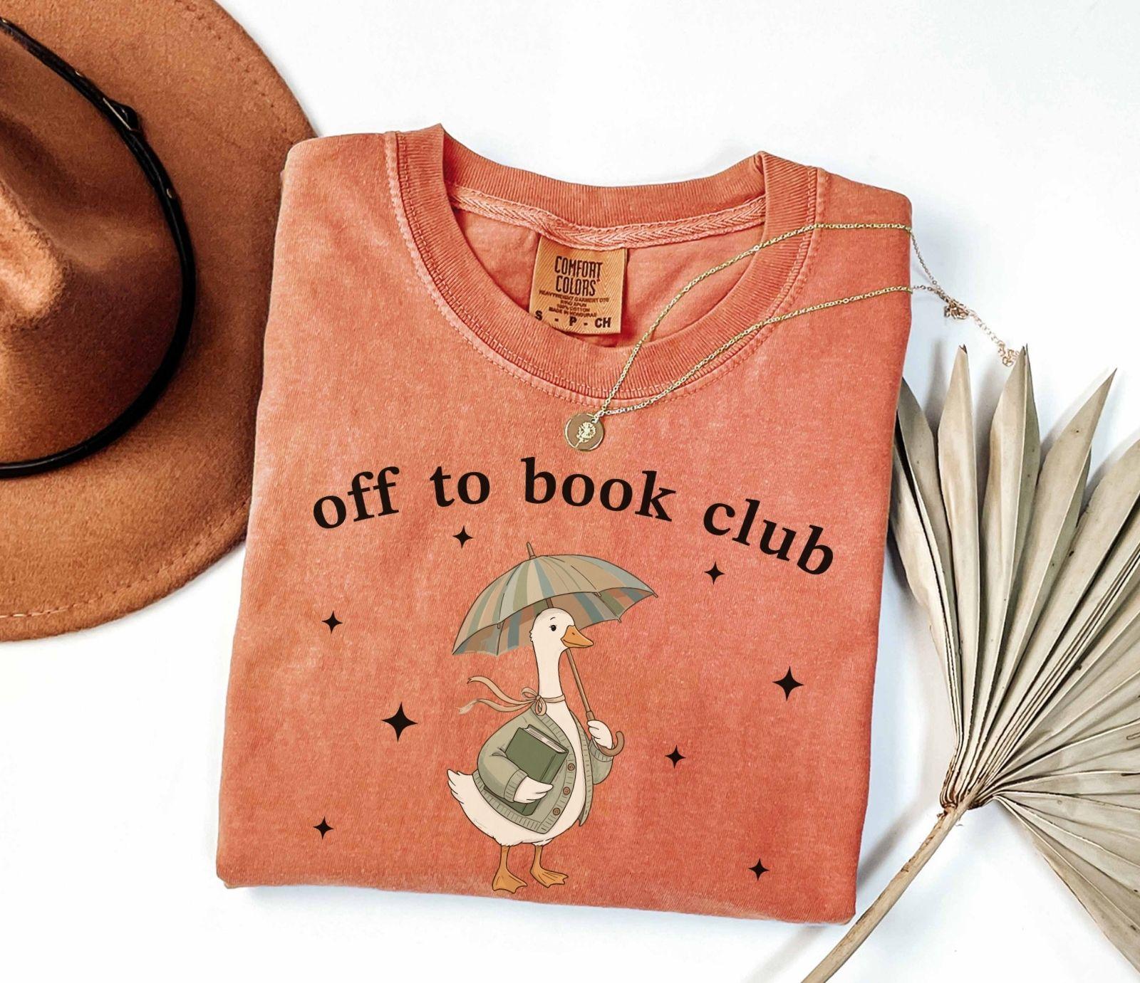 A comfort colors® shirt with the saying "off to book club"