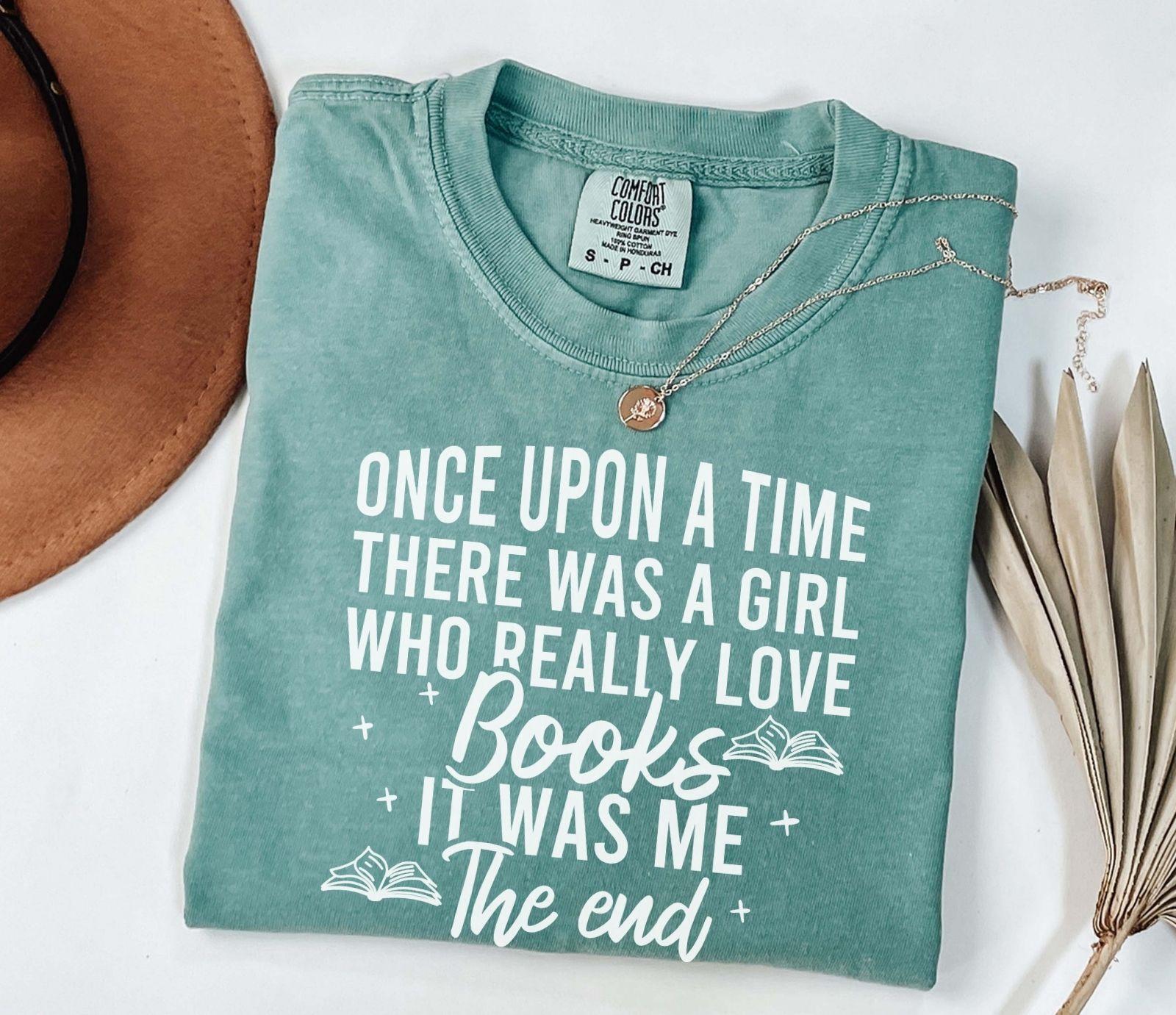 A comfort colors shirt with the saying " Once Upon A Time There Was A Girl"