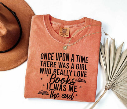 A comfort colors shirt with the saying " Once Upon A Time There Was A Girl"