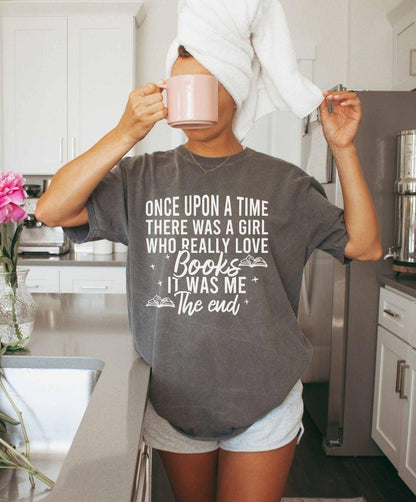 A comfort colors shirt with the saying " Once Upon A Time There Was A Girl"