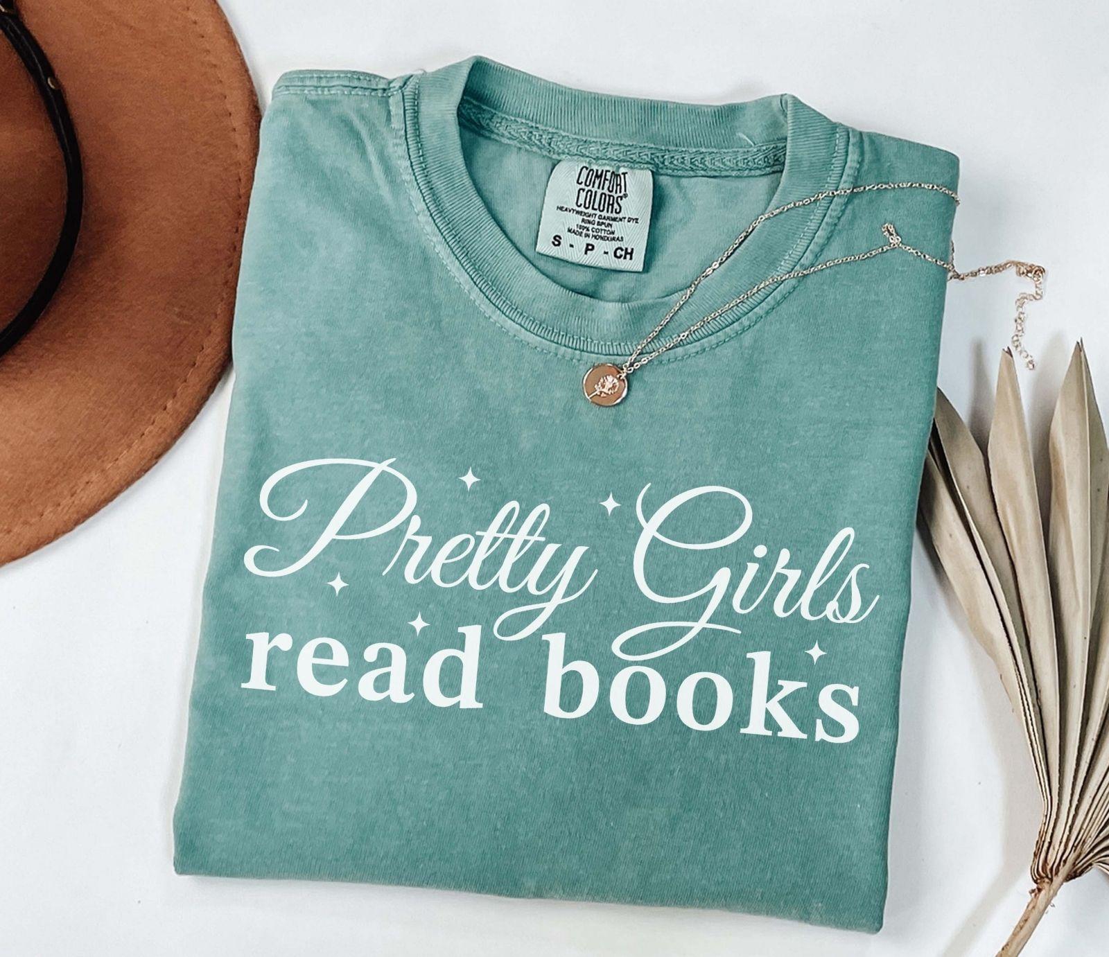 A comfort colors® shirt with the saying "Pretty girls read books"