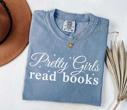 A comfort colors® shirt with the saying "Pretty girls read books"