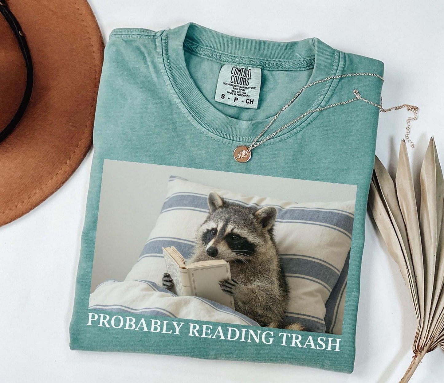 A comfort colors® shirt with the saying "probably reading trash"