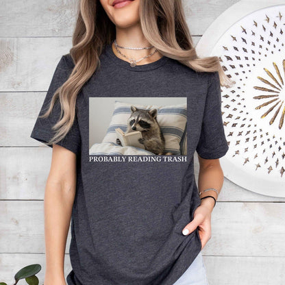 A bella canvas 3001 shirt with the saying "Probably reading trash"
