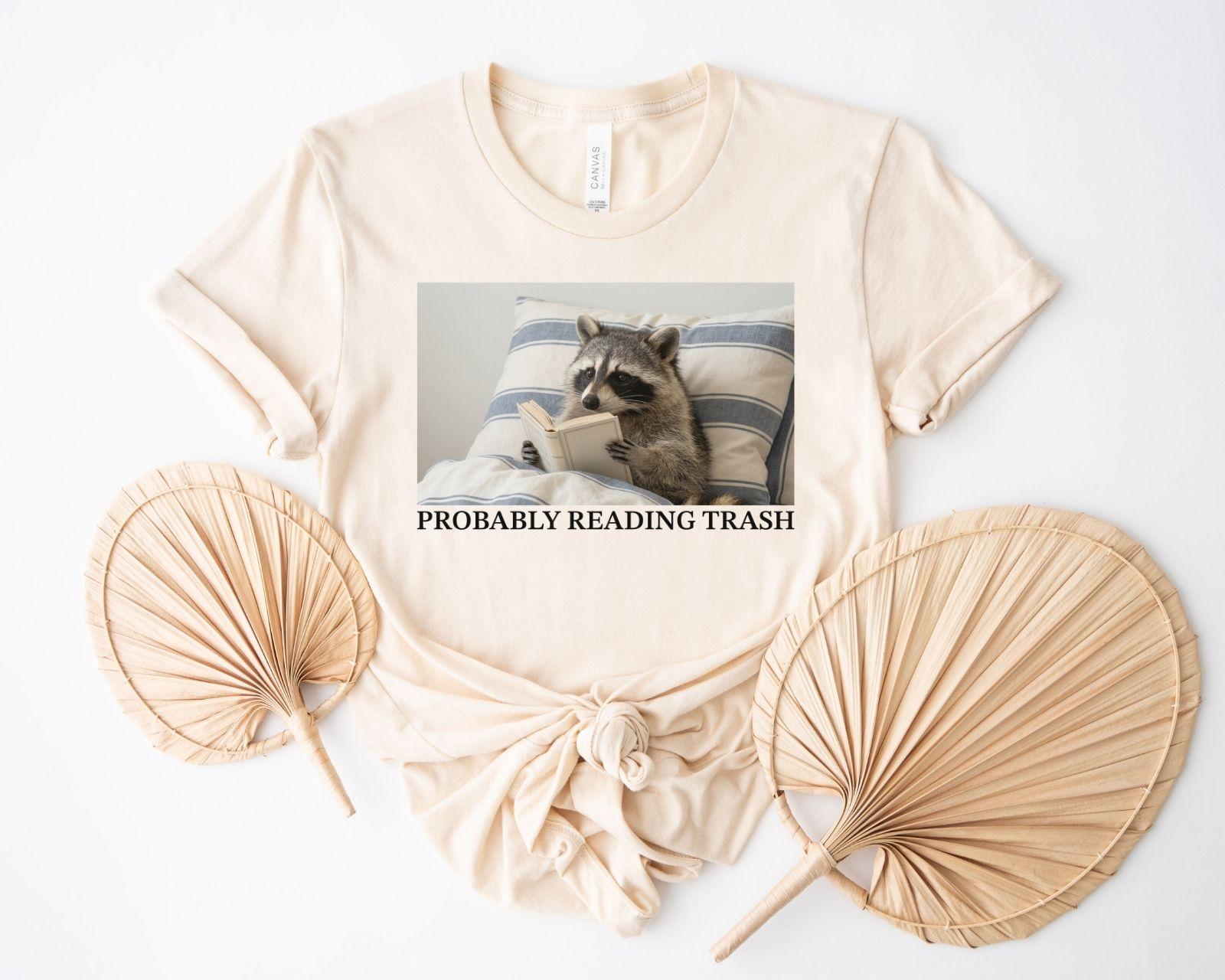 A bella canvas 3001 shirt with the saying "Probably reading trash"