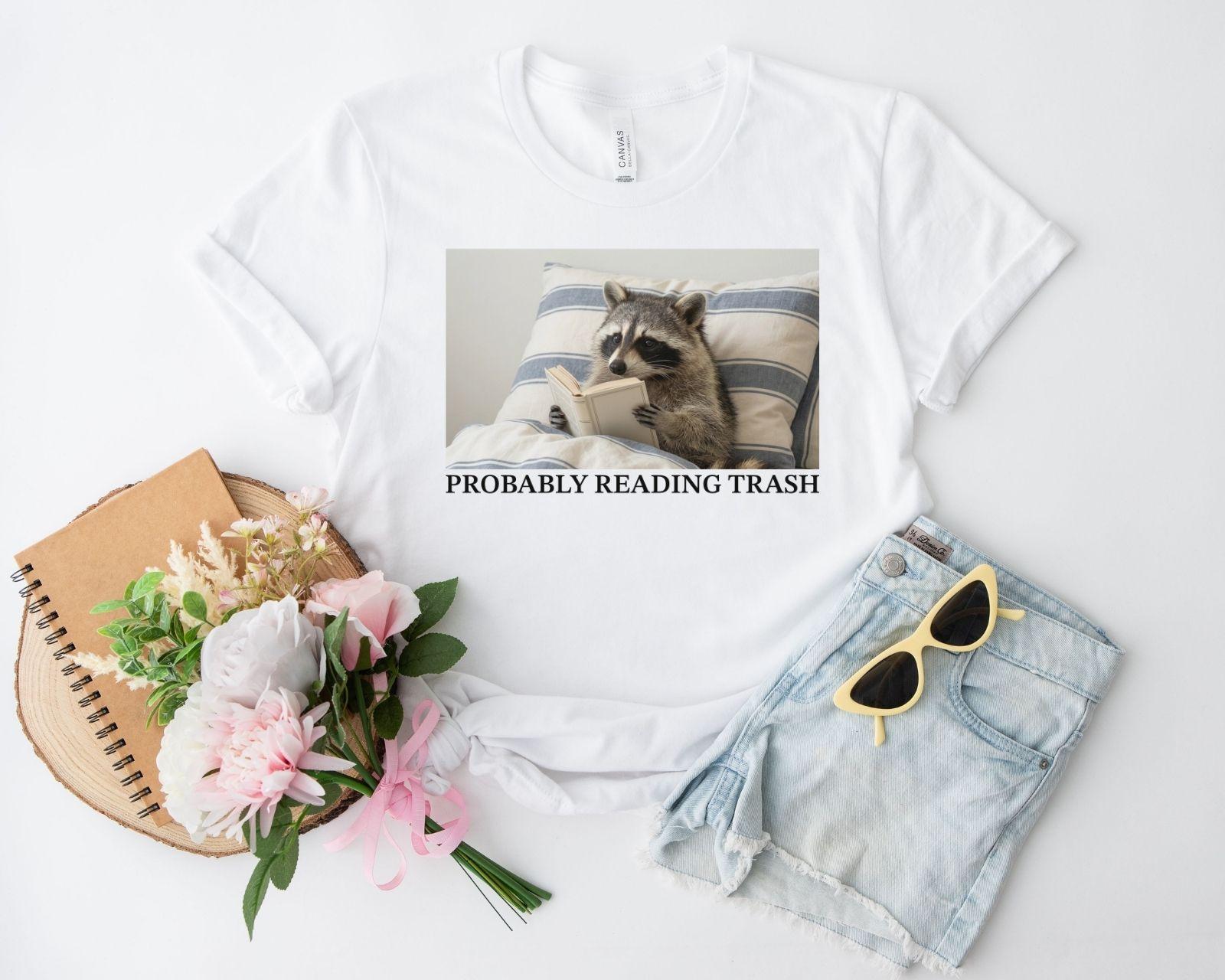 A bella canvas 3001 shirt with the saying "Probably reading trash"