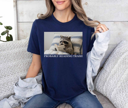 A bella canvas 3001 shirt with the saying "Probably reading trash"