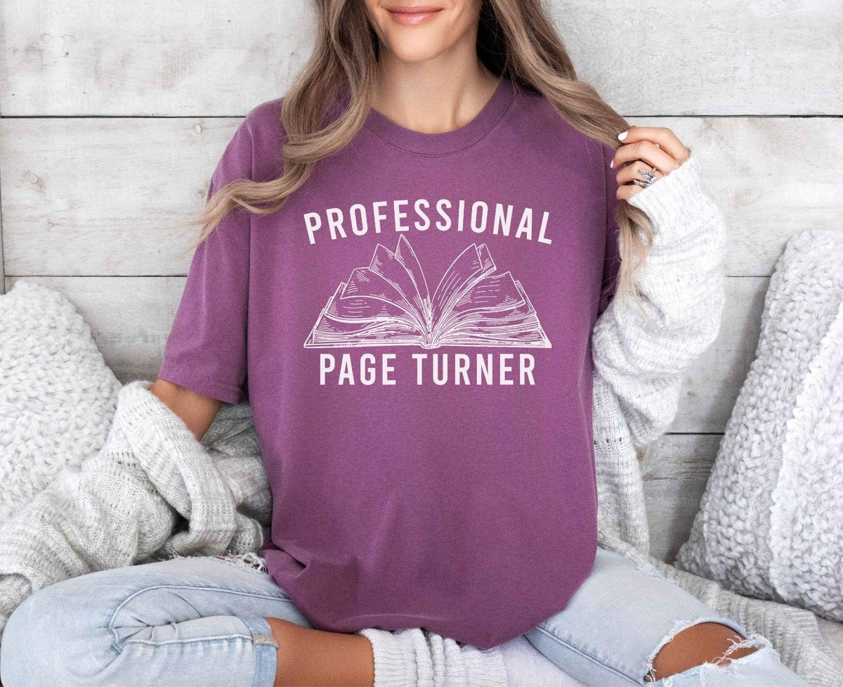 A comfort colors® shirt with the saying "Professional page turner"
