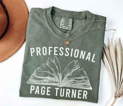 A comfort colors® shirt with the saying "Professional page turner"