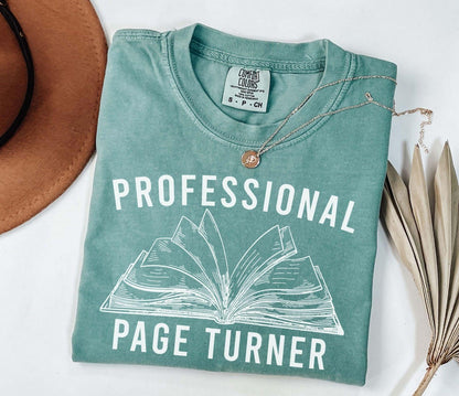 A comfort colors® shirt with the saying "Professional page turner"
