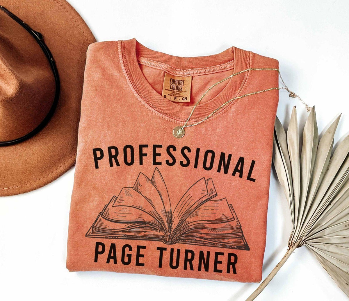 A comfort colors® shirt with the saying "Professional page turner"