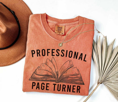 A comfort colors® shirt with the saying "Professional page turner"