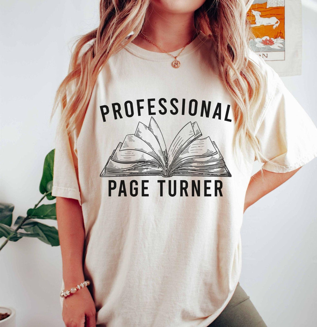 A comfort colors® shirt with the saying "Professional page turner"