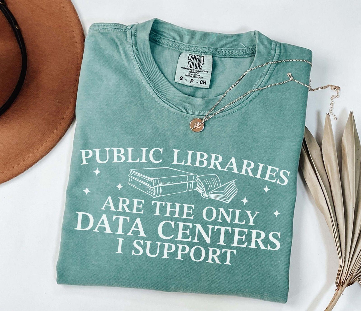 A comfort colors® shirt with the saying "public libraries are the only data centers i support"