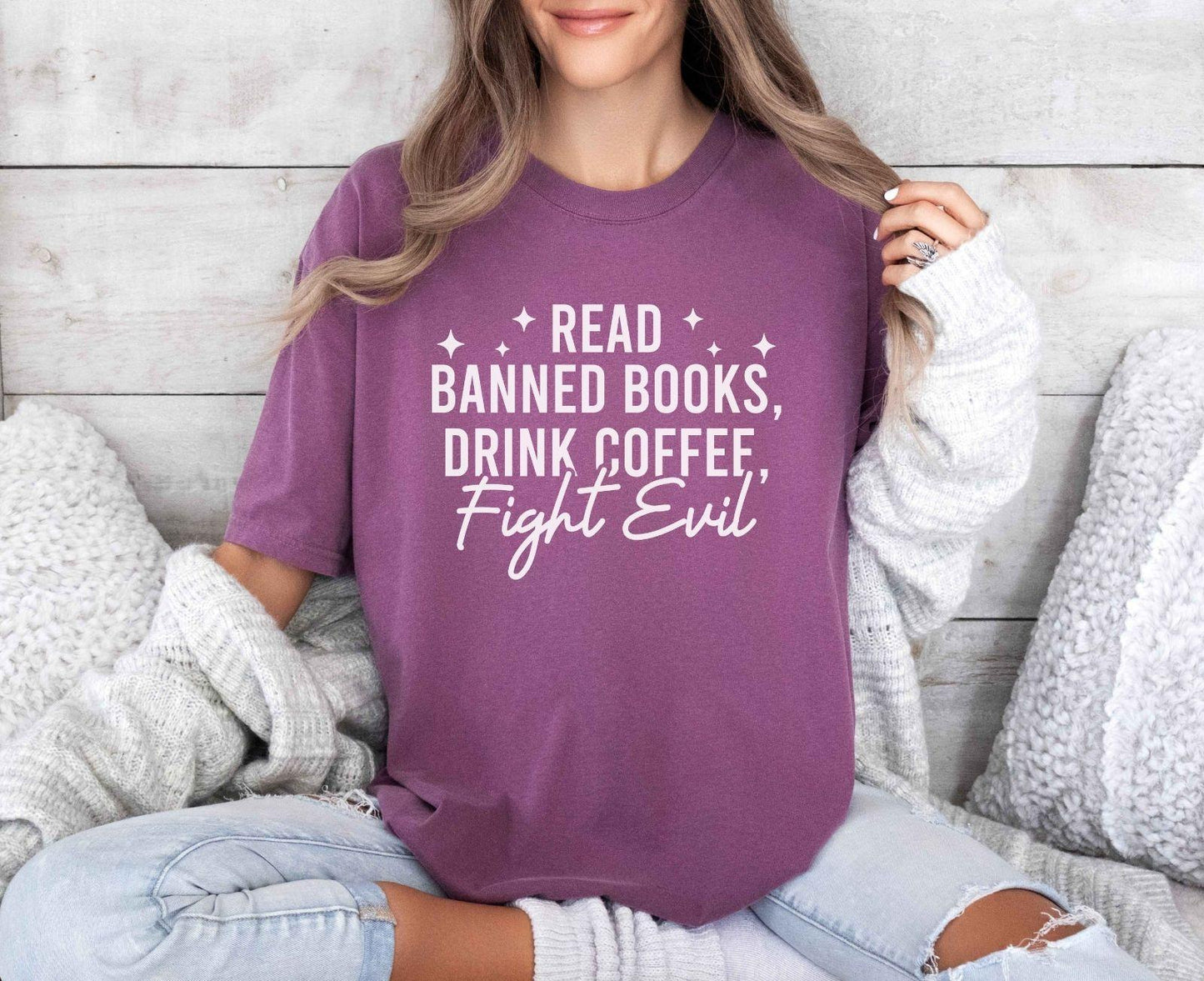 A comfort colors shirt with the saying "Read banned books drink coffee fight evil"