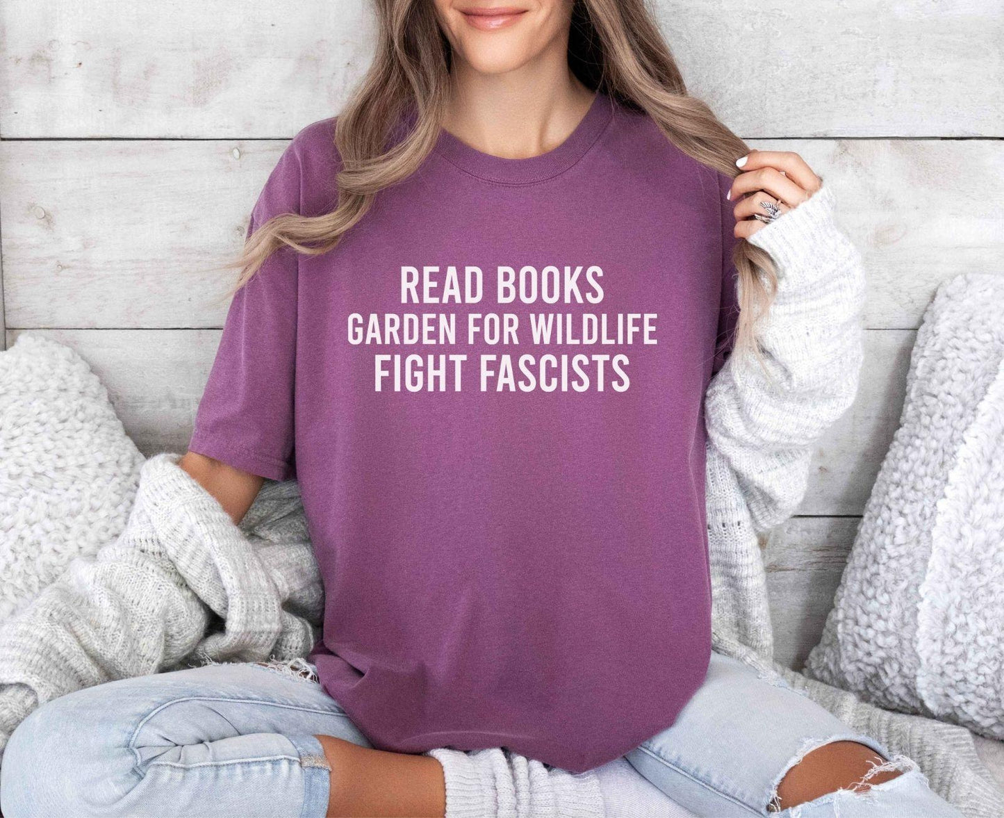 A comfort colors® shirt with the saying "read books garden for wildlife fight fascists"