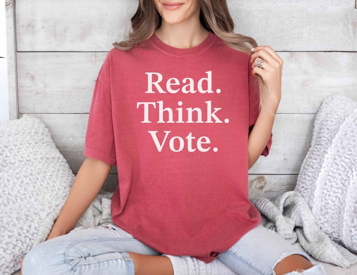 A comfort colors® shirt with the saying "read think vote"