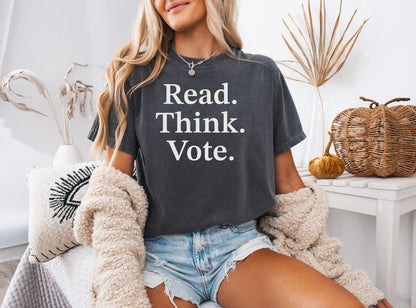 A comfort colors® shirt with the saying "read think vote"