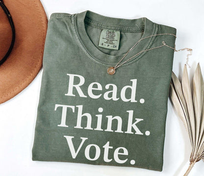 A comfort colors® shirt with the saying "read think vote"